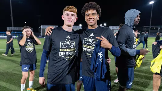 Midfielder Kadin Sadiq and midfielder Cameron Gray celebrate after an ASUN Tournament title
