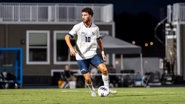 Midfielder Anton Khelil dribbles a ball at his feet