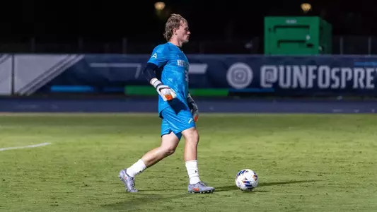 Goalkeeper Austin Gains prepares to kick a ball down the pitch