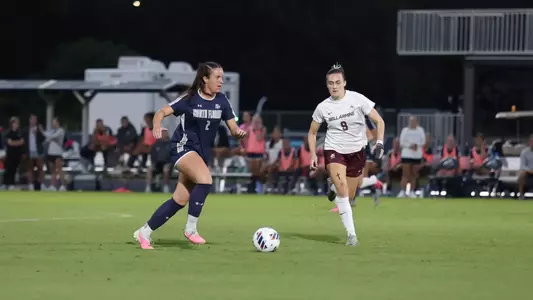Julia Cosgrove runs after ball
