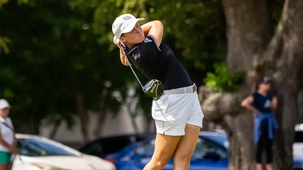 University of North Florida golfer swings a driver