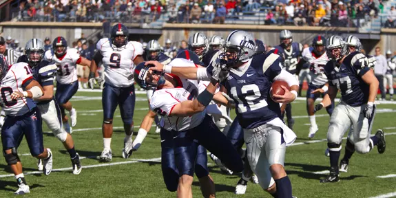 SIX INTERCEPTIONS SPEARHEAD FOOTBALL'S 17-0 HOMECOMING SHUTOUT OF RICHMOND Image