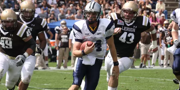 Decker Passes for 389 yards in No. 7 Football's 56-42 loss at No. 12 Towson Image