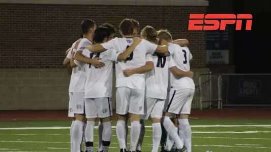 Men's soccer huddle