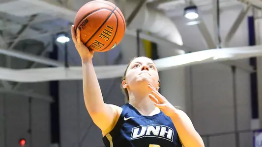 Brittni Lai goes up for two of her 20 points against Albany on Saturday.