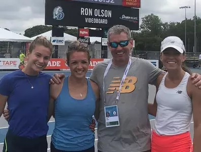 Purrier and two of her New Balance Boston teammates, Emily Durgin, left and Cory McGee, right, along with coach Mark Coogan.