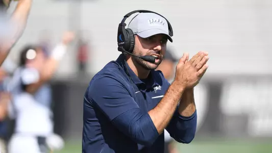 Interim head coach Ricky Santos leads the Wildcats into their first home and CAA game Saturday night at 6 vs. URI.