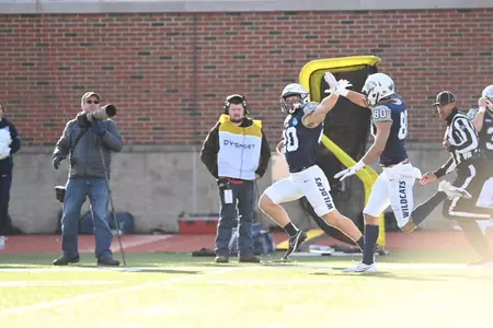 Dylan Laube is on his way to the end zone with UNH's first score in Saturday's win over Fordham. (Gil Talbot photo)