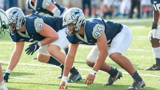 Grad student Niko Kvietkus (9) and sophomore Dylan Ruiz (94) have helped the defensive line get off to a nice start.