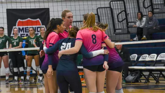 Volleyball team huddle