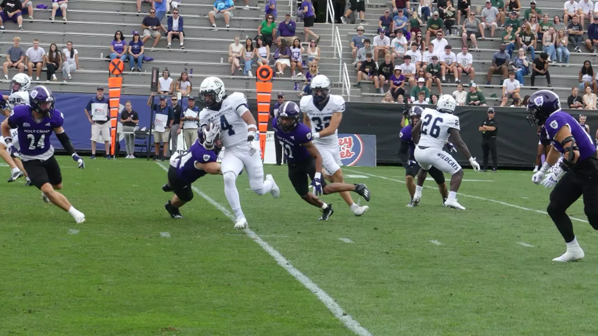Caleb Mead returns a kickoff into Holy Cross territory.