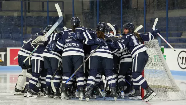 Team huddle before puck drop.