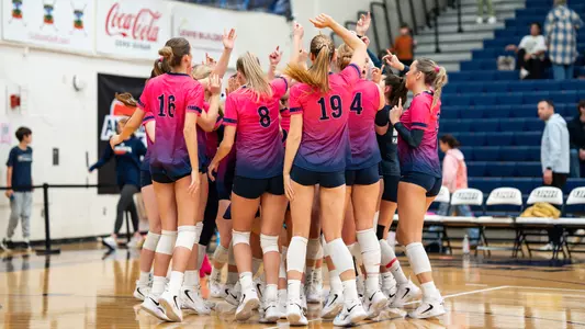 VB team celebrates a win.