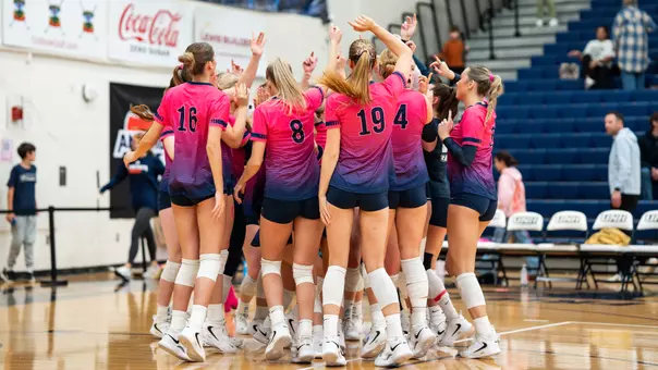 VB team celebrates a win.