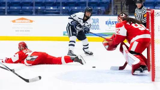 Danika Botterill puts the puck on net vs. Boston University (Oct. 9)
