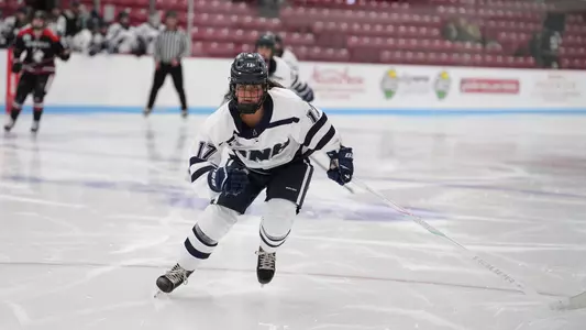 Addison Spitz skates to the puck.