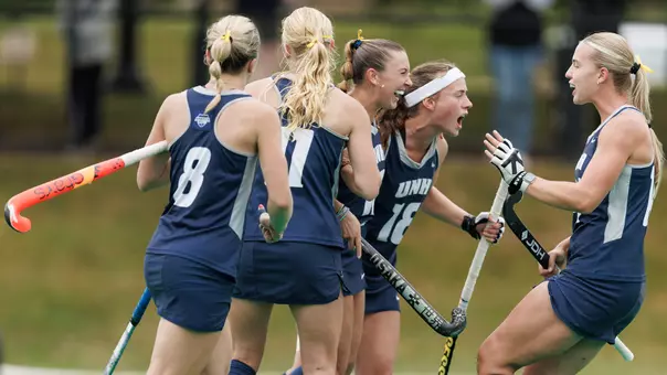UNH field hockey team celebrates a goal vs. BU (Sept. 20 2206)