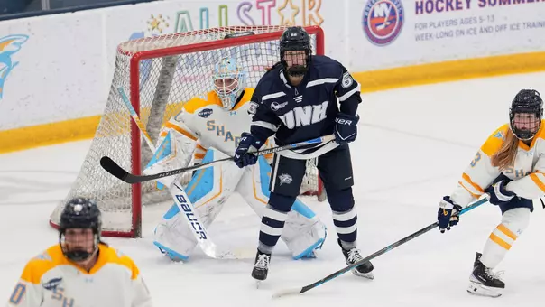 Kristen Hartman screens the LIU goaltender.
