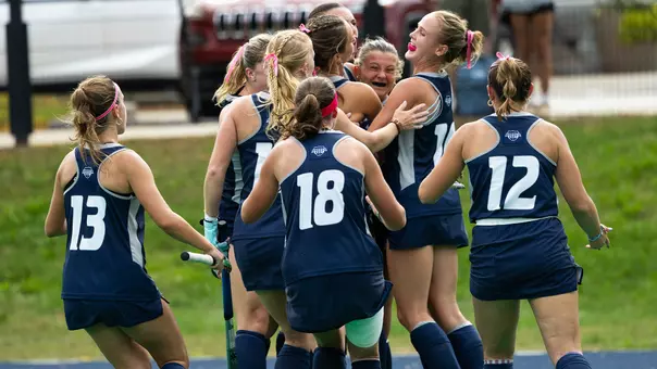 UNH celebrates Addison MacNeil's overtime game-winning goal vs. UVM (10-2-26)