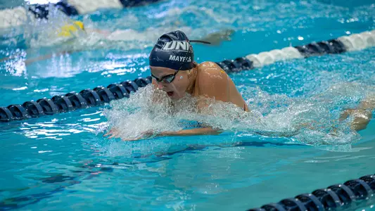 Kelsey Mayers swims during a meet vs Vermont on Oct. 17, 2026