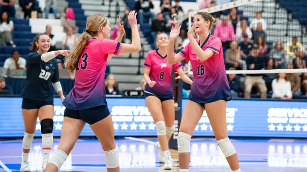 VB team celebrates a point.