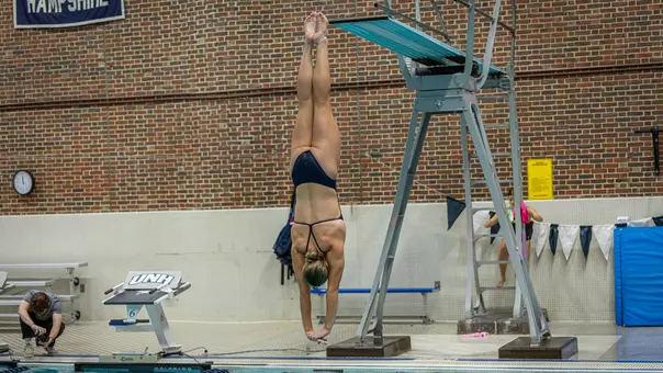 Grace Blume dives during meet vs Vermont on Oct. 17, 2026