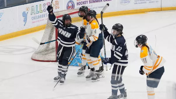 Julia Cabral and Charlie Rauch celebrate a goal against LIU