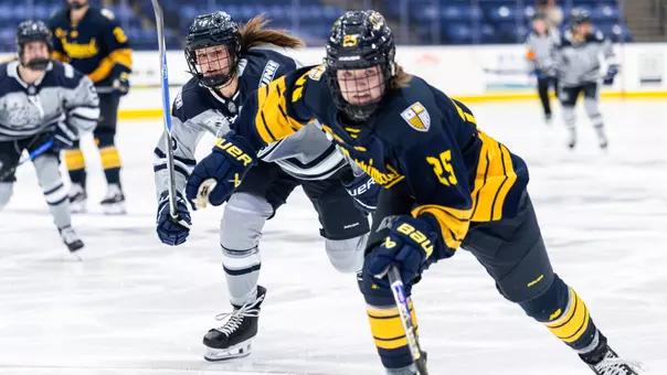 Josie Linn skates to the puck