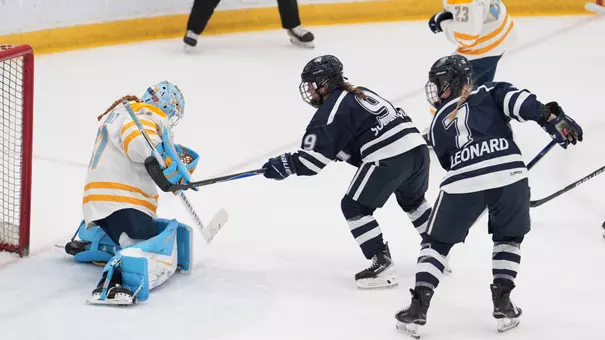 Madelyn Soderquist plays the puck on net