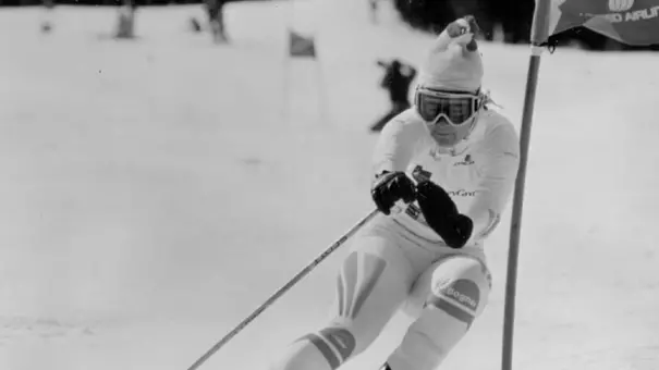 Nancy Gustafson skis down the mountain.