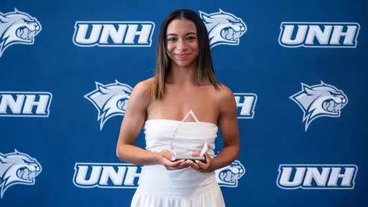 Serena Mullin poses with her 2026 UNH Gymnastics Team MVP Award