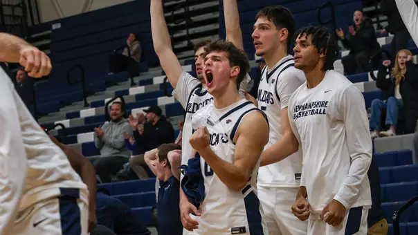 UNH men's basketball bench celebration led by Tyler Bike (vs Boston U; 12-06-25)