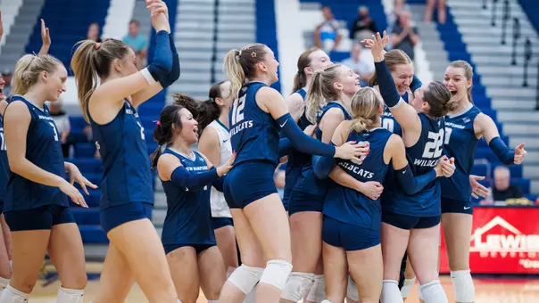 Team celebrates winning the Holly Young Invitational