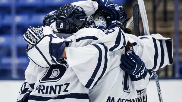 #8 Callista Printz and #1 Noemi Martinez hugging