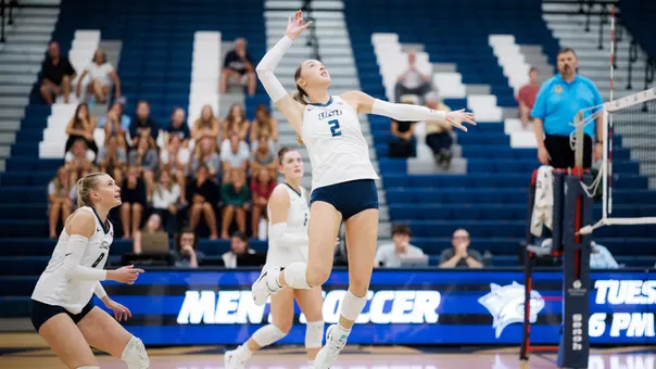 Caitlin Leddy goes up for a kill