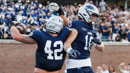 Trevor Barry and Cohen Cook celebrate Trevor's TD return of a blocked field goal vs. Stonehill