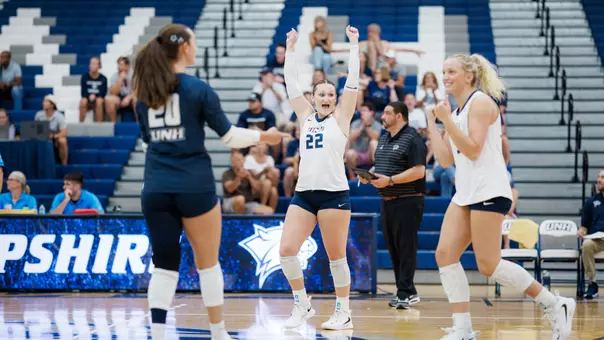 Jessica Shattles celebrates during a UNH volleyball match.