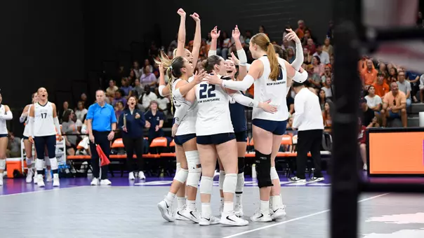 UNH Volleyball celebrates a win at Clemson.
