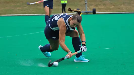 Abigail Johnson strikes the ball in the Sept. 20, 2026 home game vs. Boston U