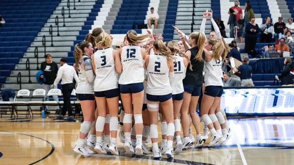 Volleyball celebrates sweeping Binghamton