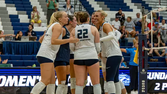 Volleyball celebrates a point win.