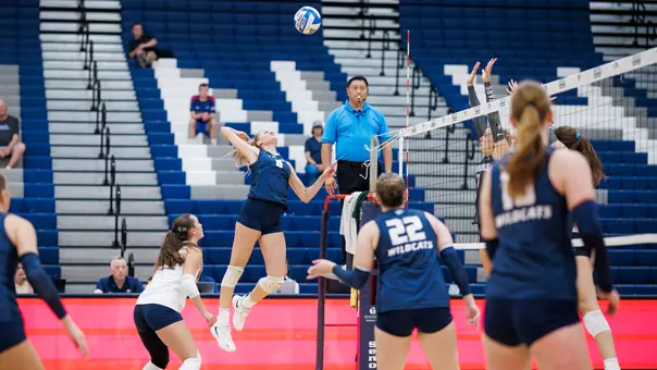 Emma Converse goes up for a kill.