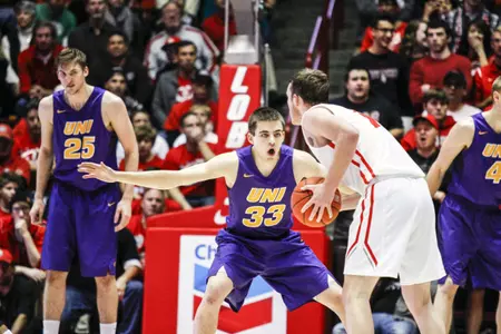 Northern Iowa's Wyatt Lohaus (33) guards New Mexico's Cullen Neal (1) during the first half an NCAA college basketball game, Saturday, Dec. 12, 2015, in Albuquerque, N.M. (AP Photo/Juan Labreche)