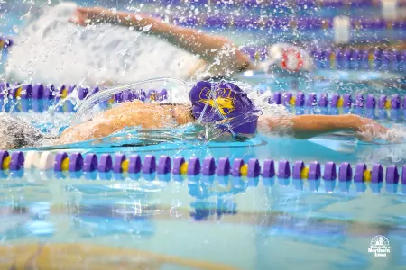 Swimming and Diving: Taylor Wins 200 IM, Panthers in 3rd Image