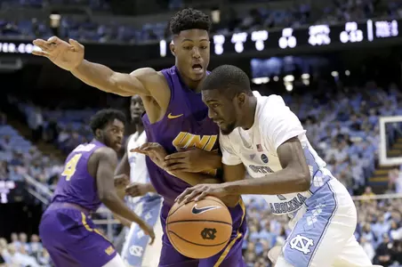 North Carolina's Brandon Robinson drives past Northern Iowa's Isaiah Brown during the first half of an NCAA college basketball game in Chapel Hill, N.C., Friday, Nov. 10, 2017. (AP Photo/Gerry Broome)