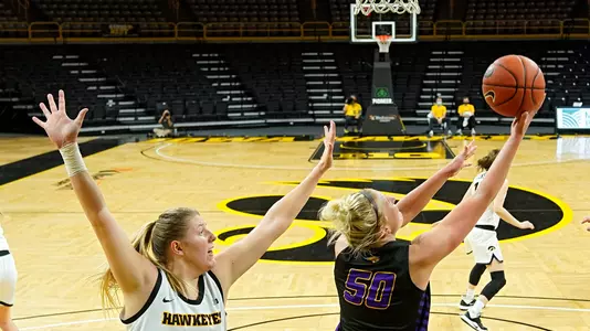 Northern Iowa Panthers forward Megan Maahs (50) hooks in a basket during the second quarter of their game at Carver-Hawkeye Arena in Iowa City on Wednesday, November 25, 2020. (Stephen Mally/hawkeyesports.com)