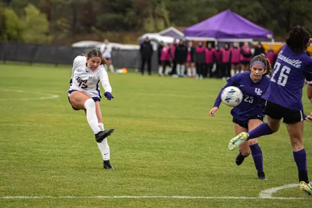 Olivia Knoepfle strikes a ball during UNI's match against Evansville on Oct. 12, 2023
