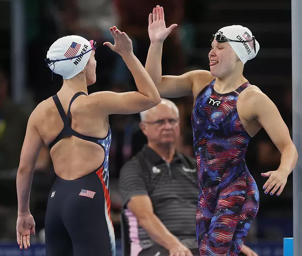 NANTERRE, FRANCE - AUGUST 29: Grace Nuhfer and Olivia Chambers of Team United States interact prior to the heats of the Women's 100m Butterfly on day one of the Paris 2024 Summer Paralympic Games at Paris La Defense Arena on August 29, 2024 in Nanterre, France. (Photo by Ian MacNicol/Getty Images)