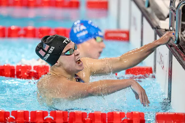 NANTERRE, FRANCE - AUGUST 31: Olivia Chambers of Team United States celebrates winning the gold medal after competing in the Women's 400m Freestyle - S13 Final on day three of the Paris 2024 Summer Paralympic Games at Paris La Defense Arena on August 31, 2024 in Nanterre, France. (Photo by Sean M. Haffey/Getty Images)