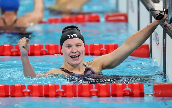 NANTERRE, FRANCE - AUGUST 31: Olivia Chambers of Team United States celebrates winning the gold medal after competing in the Women's 400m Freestyle - S13 Final on day three of the Paris 2024 Summer Paralympic Games at Paris La Defense Arena on August 31, 2024 in Nanterre, France. (Photo by Sean M. Haffey/Getty Images)